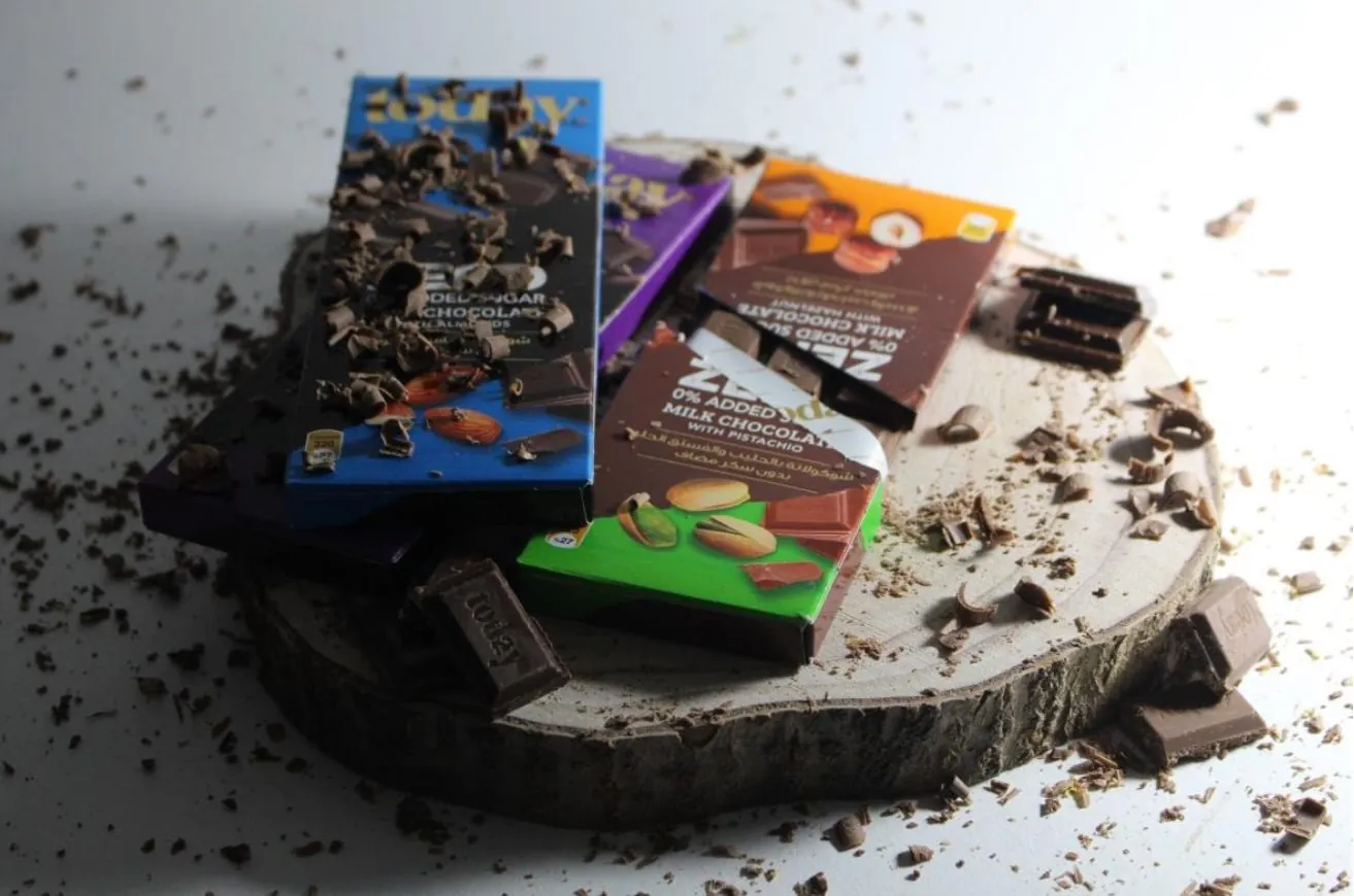 Chocolate bars on a wooden board