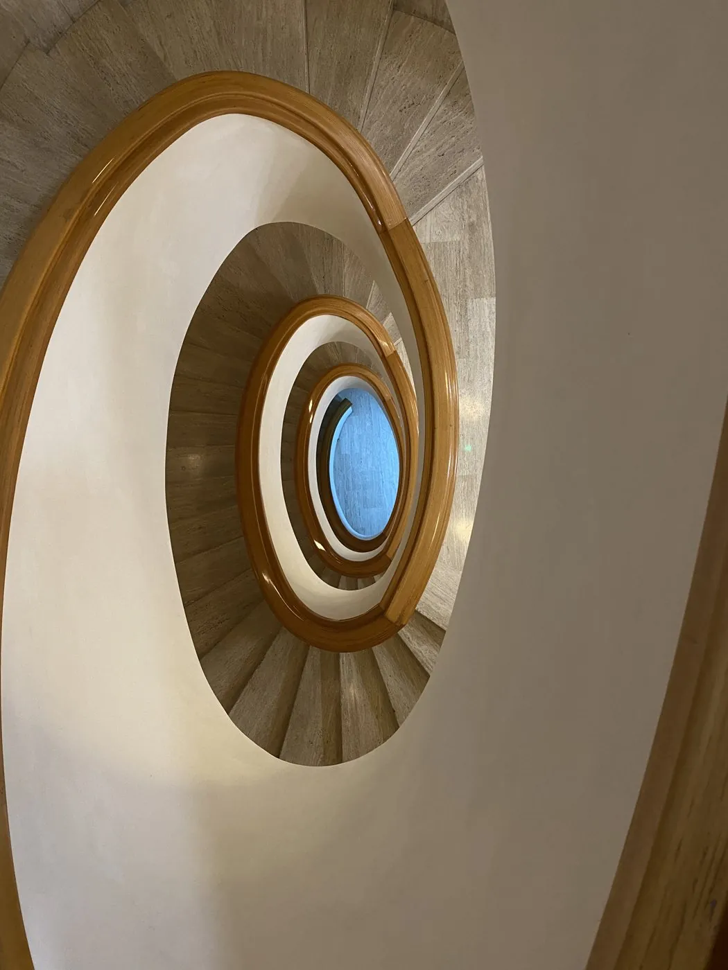 Looking down a spiral staircase